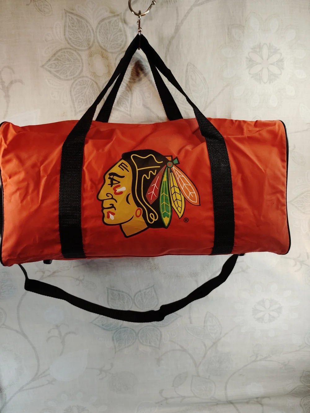 NHL Blackhawks Orange Duffel Bag with Team Logo and Black Straps